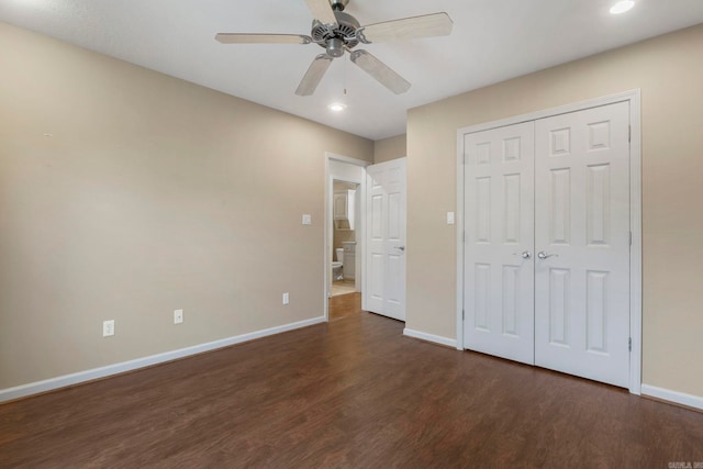 unfurnished bedroom with dark wood-type flooring, baseboards, recessed lighting, a ceiling fan, and a closet