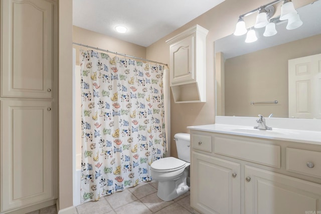 full bath with tile patterned flooring, toilet, vanity, and curtained shower