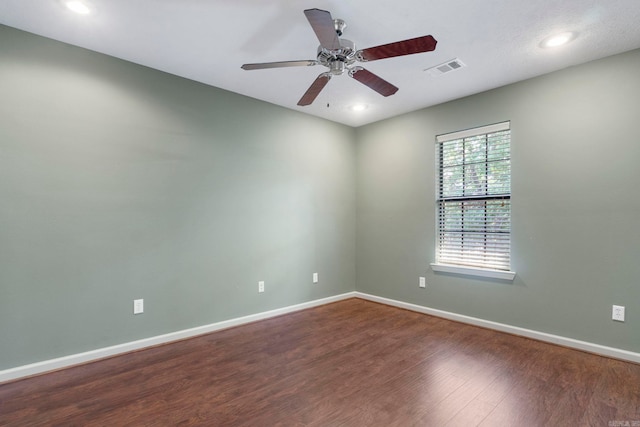spare room with wood finished floors, baseboards, ceiling fan, and recessed lighting