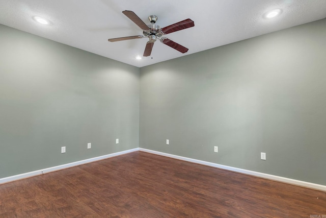unfurnished room featuring ceiling fan, wood finished floors, baseboards, and recessed lighting