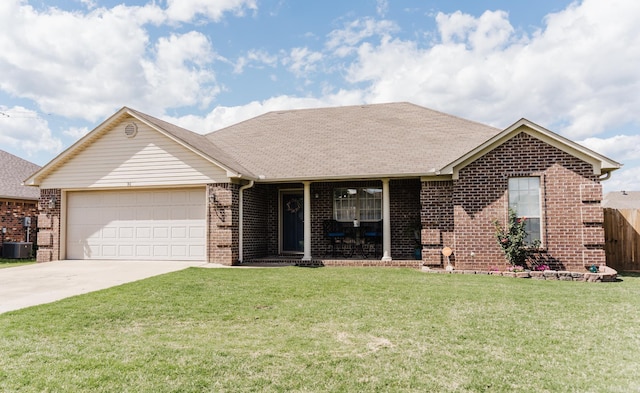 single story home with brick siding, a garage, driveway, a porch, and central AC unit