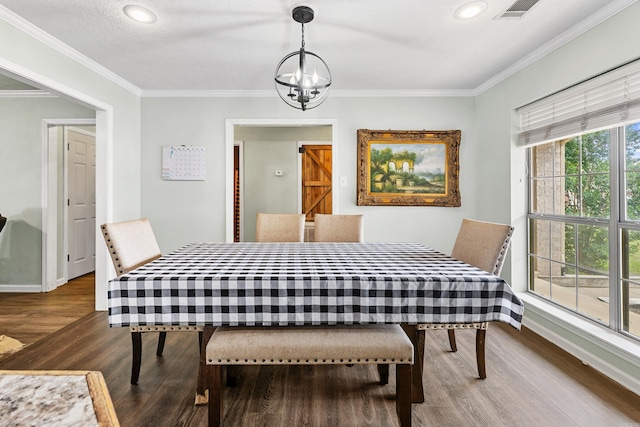 12 High Plains Dr, Cabot, AR 72023 - dining room featuring wood finished floors, a chandelier, ornamental molding, recessed lighting, and baseboards
