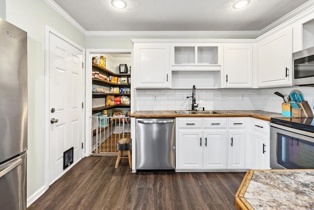 12 High Plains Dr, Cabot, AR 72023 - kitchen featuring stainless steel appliances, open shelves, dark wood-type flooring, wooden counters, and white cabinets