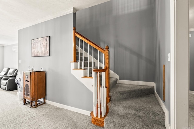stairs with carpet floors, ornamental molding, and baseboards