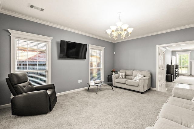 carpeted living room featuring a chandelier, baseboards, and crown molding