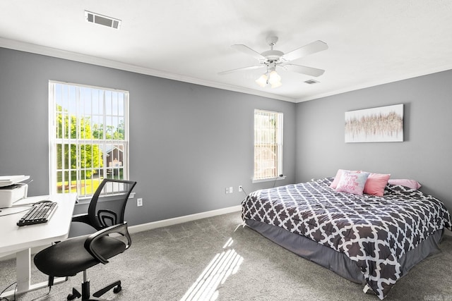 bedroom with carpet flooring, crown molding, baseboards, a desk, and ceiling fan