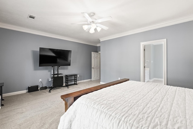 carpeted bedroom featuring crown molding, baseboards, and ceiling fan