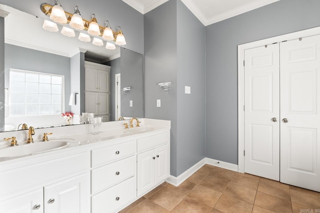 full bathroom with ornamental molding, double vanity, baseboards, tile patterned flooring, and a bathtub