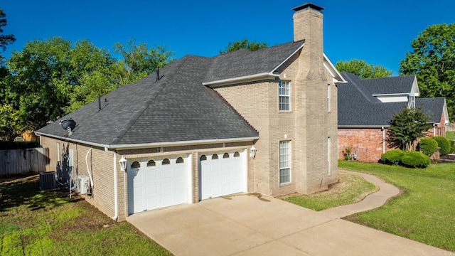 view of home's exterior with an attached garage, driveway, brick siding, a shingled roof, and a chimney