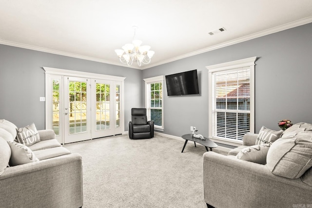 carpeted living area featuring a chandelier, ornamental molding, and baseboards