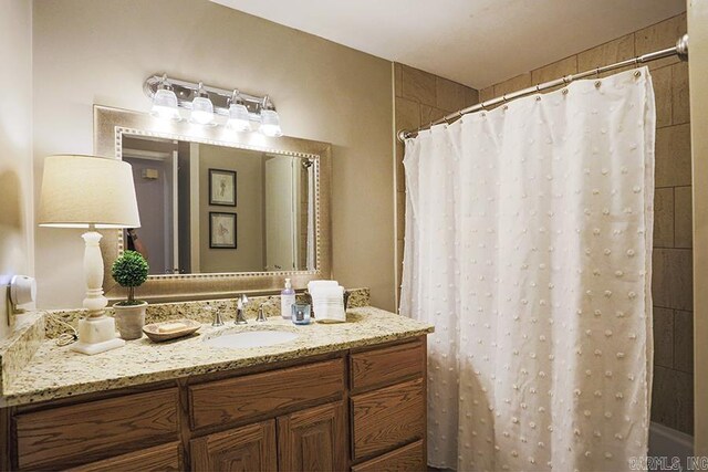8113 Leatrice Dr, Little Rock, AR 72227 - bathroom with vanity and curtained shower