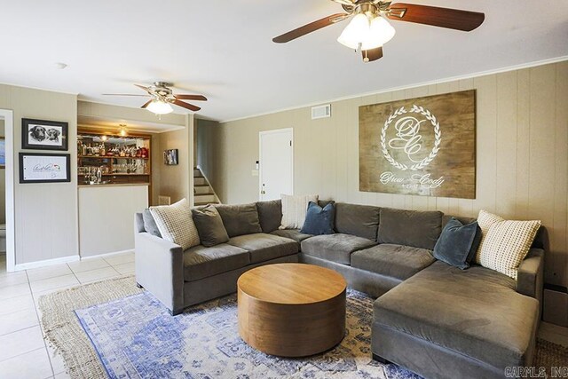 8113 Leatrice Dr, Little Rock, AR 72227 - tiled living area with ceiling fan, stairs, and ornamental molding
