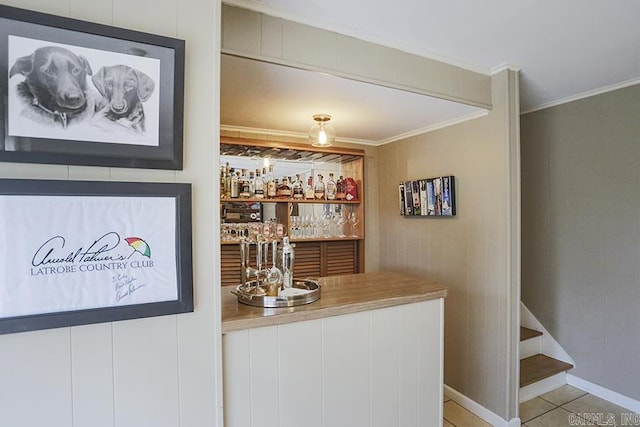 8113 Leatrice Dr, Little Rock, AR 72227 - indoor bar with ornamental molding, light tile patterned floors, and baseboards