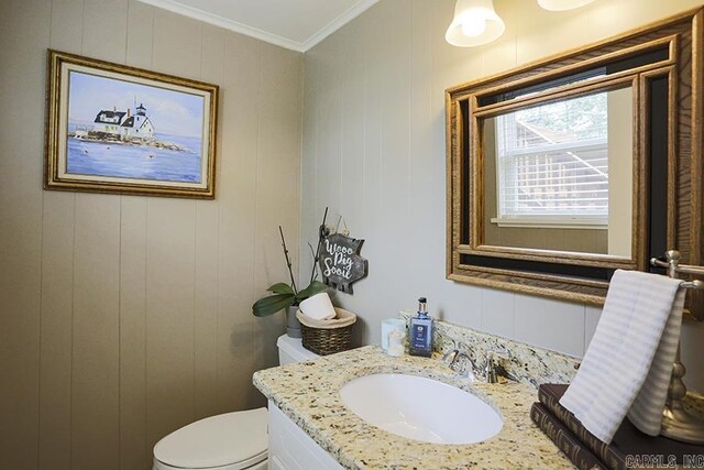 8113 Leatrice Dr, Little Rock, AR 72227 - bathroom featuring vanity, toilet, and crown molding