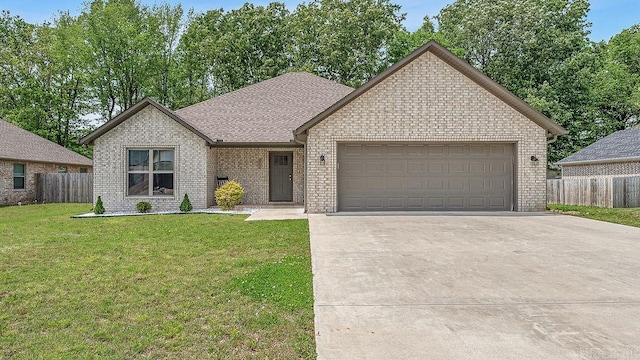 ranch-style home with driveway, a garage, and brick siding
