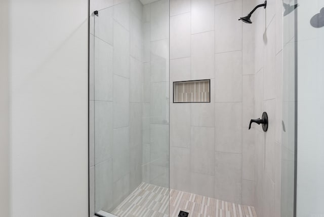 bathroom featuring a stall shower
