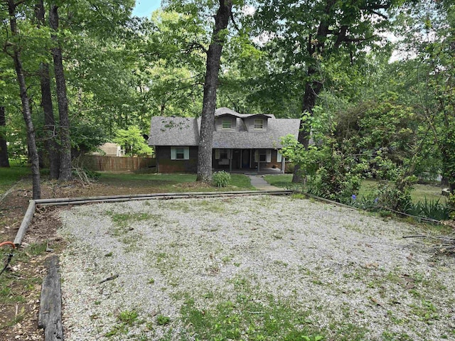 240 Round Up Ln, Mountain Home, AR 72653 - view of front of property with a shingled roof, fence, and a porch
