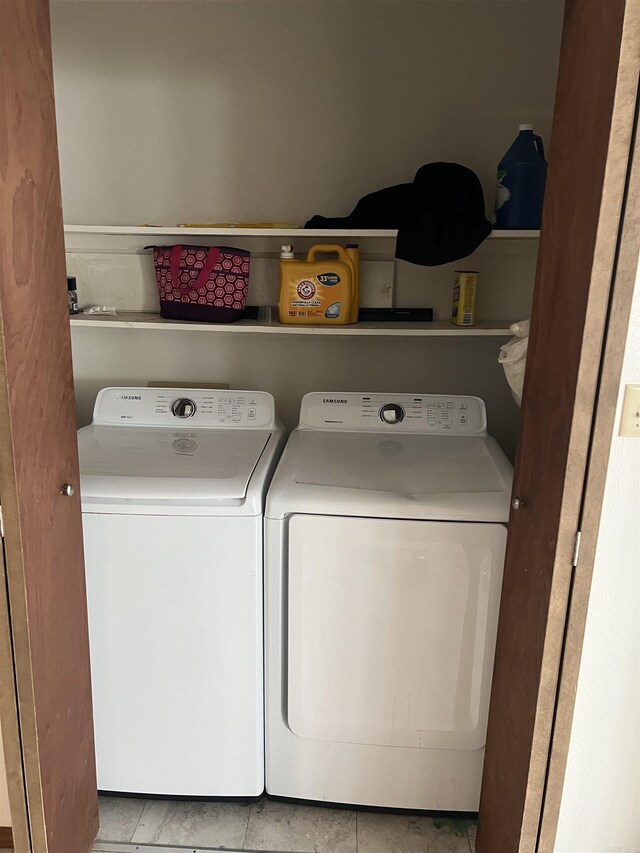 240 Round Up Ln, Mountain Home, AR 72653 - laundry area with independent washer and dryer and tile patterned floors