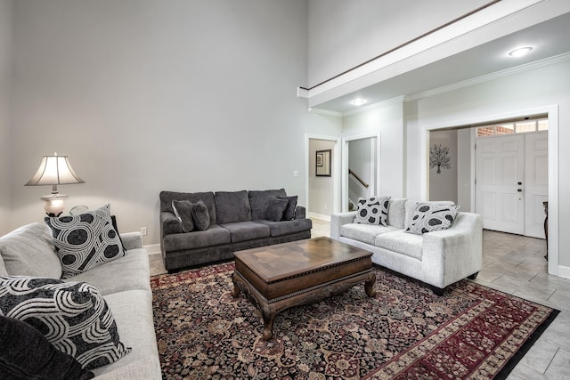 406 Parliament St, Little Rock, AR 72211 - living area featuring crown molding, baseboards, a high ceiling, and stairs