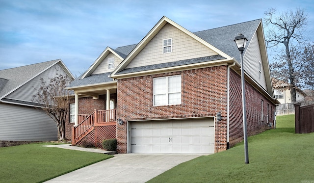 406 Parliament St, Little Rock, AR 72211 - view of front of property featuring brick siding, a garage, and a front lawn