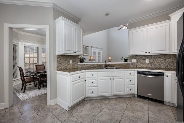 406 Parliament St, Little Rock, AR 72211 - kitchen with stainless steel dishwasher, ornamental molding, decorative backsplash, a sink, and white cabinetry