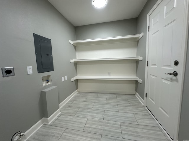 706 Scott St, Sheridan, AR 72150 - washroom with electric panel, hookup for an electric dryer, washer hookup, and baseboards