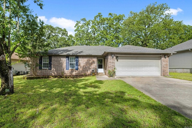 ranch-style home with brick siding, an attached garage, driveway, and a front lawn