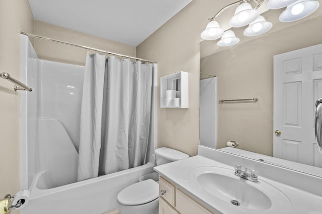 full bath with toilet, shower / bath combo, and vanity