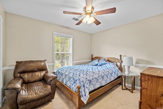 carpeted bedroom with baseboards and ceiling fan