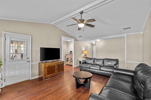 living area with wood finished floors, ceiling fan, baseboards, and ornamental molding