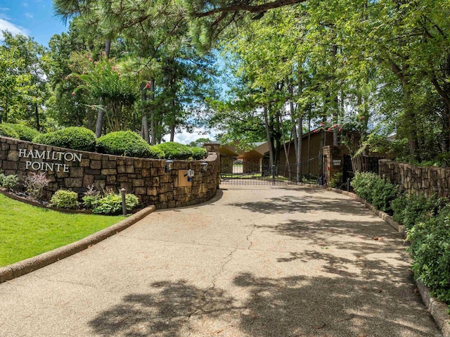 5000 Central Ave Unit 26-27, Hot Springs, AR 71913 - view of asphalt driveway featuring a gate
