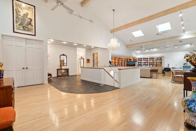 5000 Central Ave Unit 26-27, Hot Springs, AR 71913 - reception area featuring beamed ceiling, ceiling fan, a skylight, high vaulted ceiling, and a chandelier