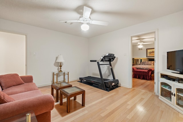 5000 Central Ave Unit 26-27, Hot Springs, AR 71913 - workout room featuring a ceiling fan, light wood-style floors, and baseboards