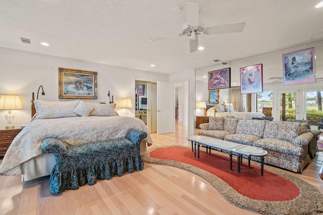 5000 Central Ave Unit 26-27, Hot Springs, AR 71913 - bedroom featuring wood finished floors, a textured ceiling, recessed lighting, and a ceiling fan