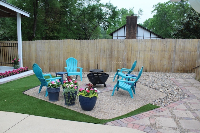 1108 N 14th St, Nashville, AR 71852 - view of patio with fence and an outdoor fire pit