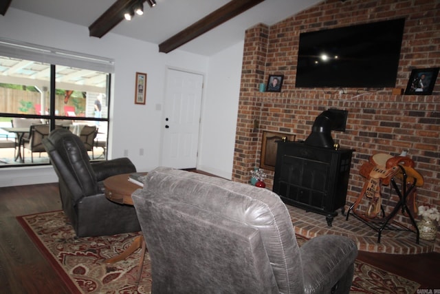1108 N 14th St, Nashville, AR 71852 - living room with a wood stove and wood finished floors