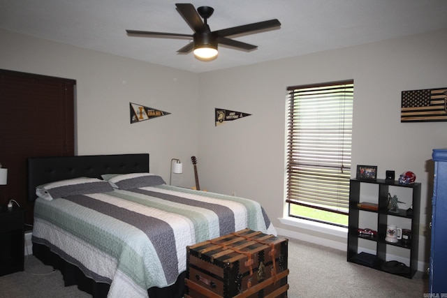 1108 N 14th St, Nashville, AR 71852 - bedroom with carpet, baseboards, and ceiling fan