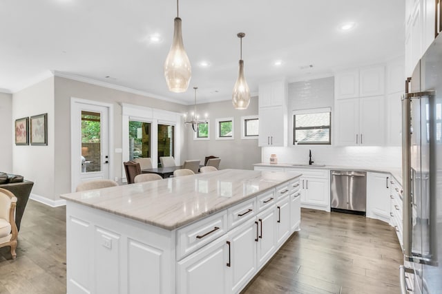 17 Cove Creek Pt, Little Rock, AR 72211 - kitchen featuring appliances with stainless steel finishes, a sink, a center island, healthy amount of natural light, and recessed lighting