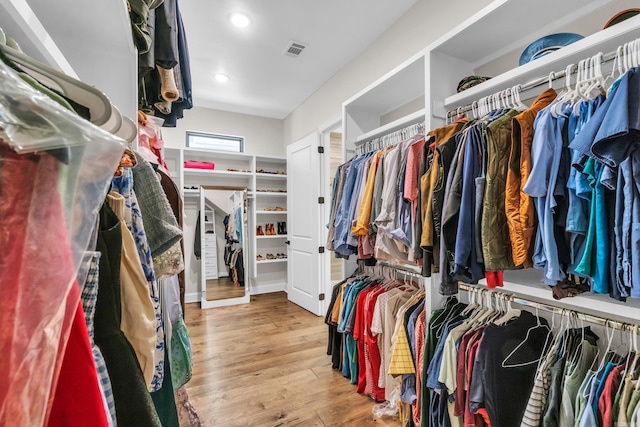 17 Cove Creek Pt, Little Rock, AR 72211 - walk in closet featuring wood finished floors