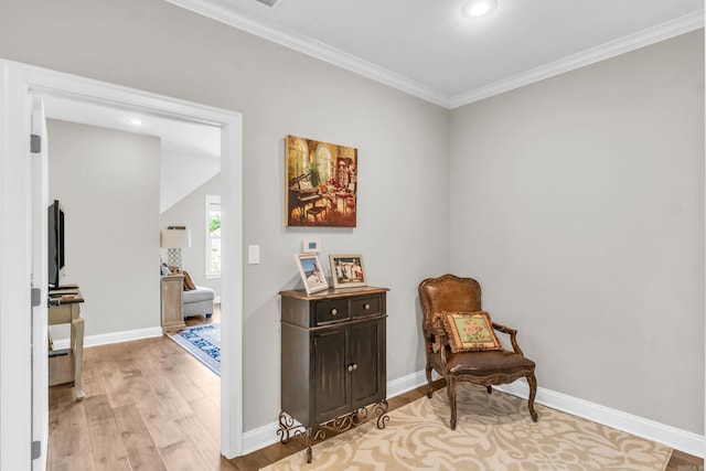 17 Cove Creek Pt, Little Rock, AR 72211 - sitting room with light wood-style flooring, baseboards, crown molding, and recessed lighting