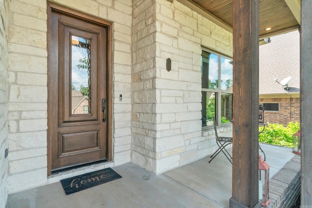 17 Cove Creek Pt, Little Rock, AR 72211 - view of exterior entry featuring covered porch and stone siding