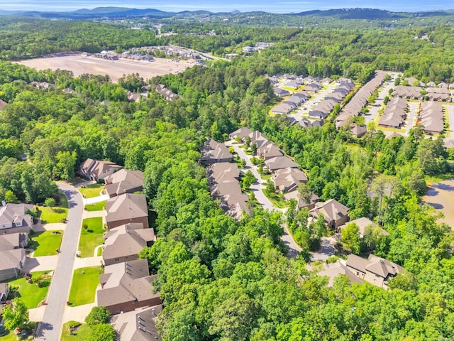 17 Cove Creek Pt, Little Rock, AR 72211 - aerial view of residential area with a heavily wooded area