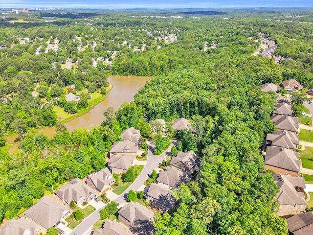 17 Cove Creek Pt, Little Rock, AR 72211 - aerial view of residential area with a large body of water and a heavily wooded area