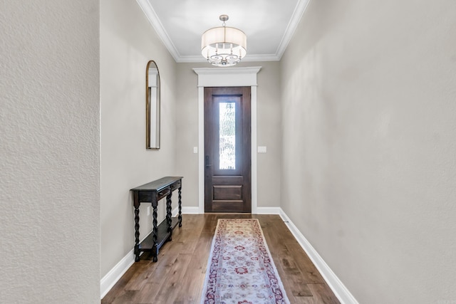 17 Cove Creek Pt, Little Rock, AR 72211 - entryway with wood finished floors, a chandelier, ornamental molding, and baseboards