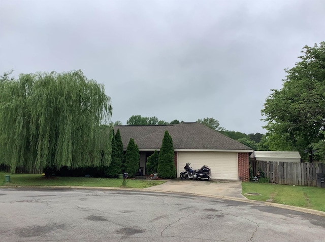 713 Covenant Pl, Searcy, AR 72143 - view of front of property with driveway, a garage, and a shingled roof