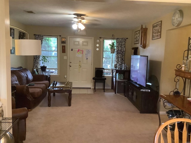 713 Covenant Pl, Searcy, AR 72143 - living area with light colored carpet and a ceiling fan