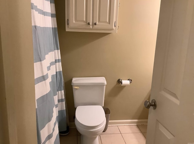 713 Covenant Pl, Searcy, AR 72143 - bathroom featuring tile patterned flooring, baseboards, toilet, and a shower with shower curtain