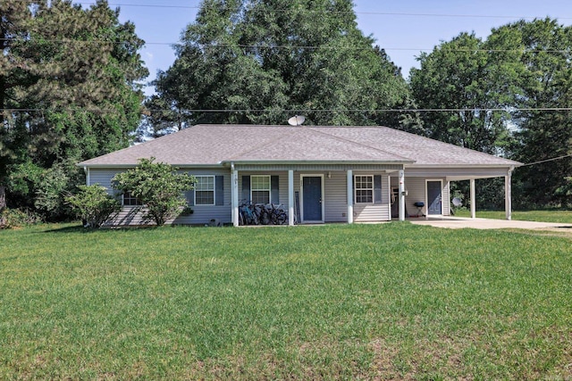 single story home with a porch, a front lawn, a carport, and concrete driveway