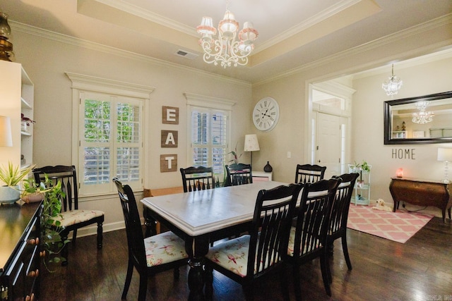 51 Waters Edge Dr, Little Rock, AR 72204 - dining area with a chandelier, dark wood-style floors, a raised ceiling, and ornamental molding