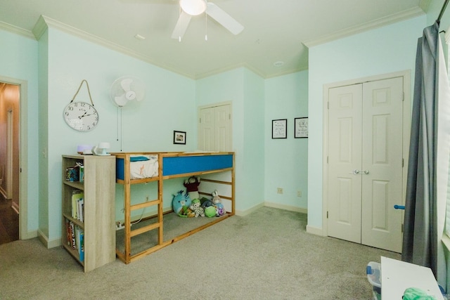 51 Waters Edge Dr, Little Rock, AR 72204 - bedroom with crown molding, carpet floors, baseboards, ceiling fan, and a closet